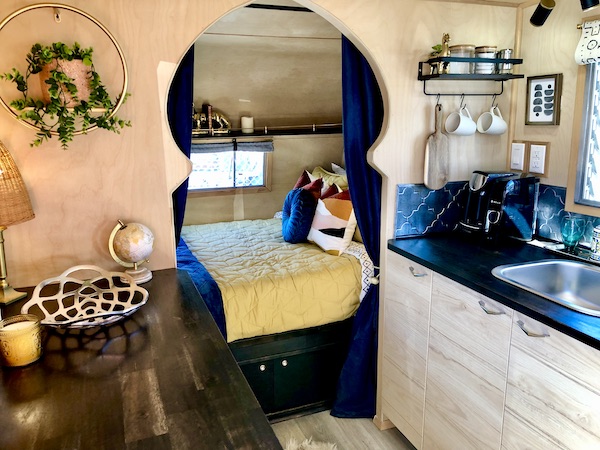 The interior of a vintage camper that has a Moroccan theme at the Palm Springs CA Vintage Trailer Show