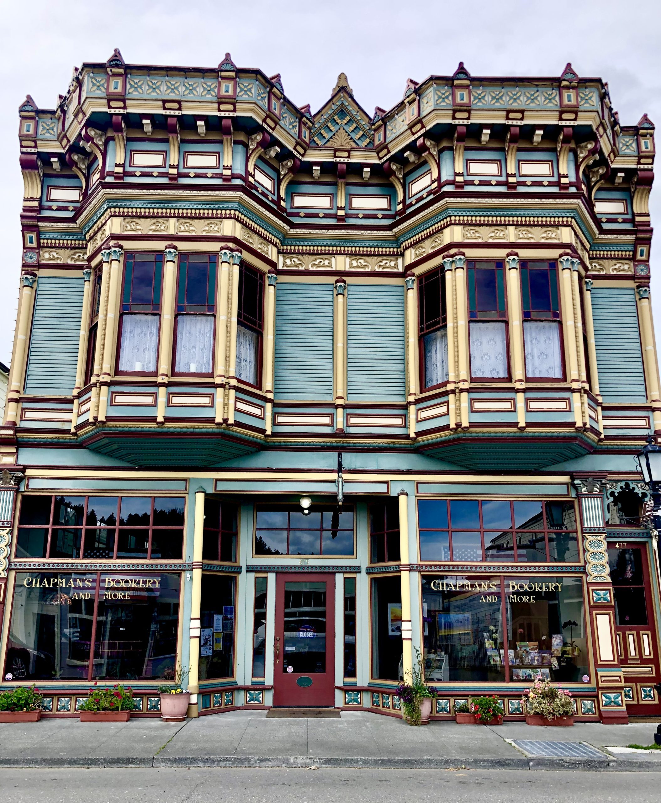 A seafoam, red and beige Victorian building along the California Northern Coast Part II