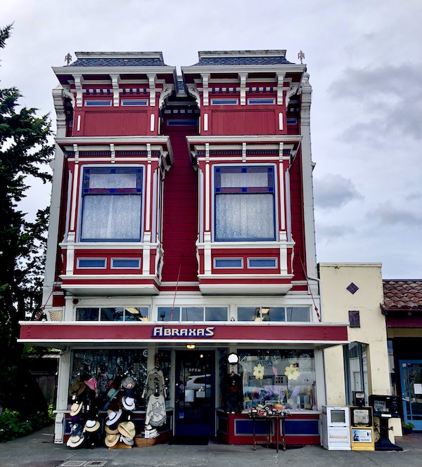 A red Victorian building with beige trim along California Northern Coast Part II