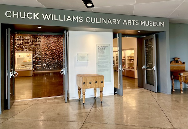 The entrance to a culinary arts museum with an antique butcher block in center. Visiting was part of our Fun in Downtown Napa CA