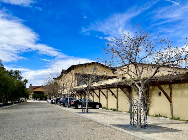 Farm style building with cars parked in front on our Napa Valley Winery Tour