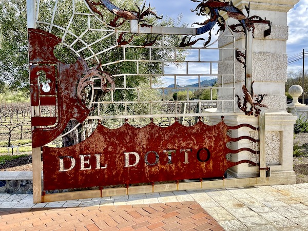 A winery entry gate with "Del Dotto" cut out on our Napa Valley Winery Tour