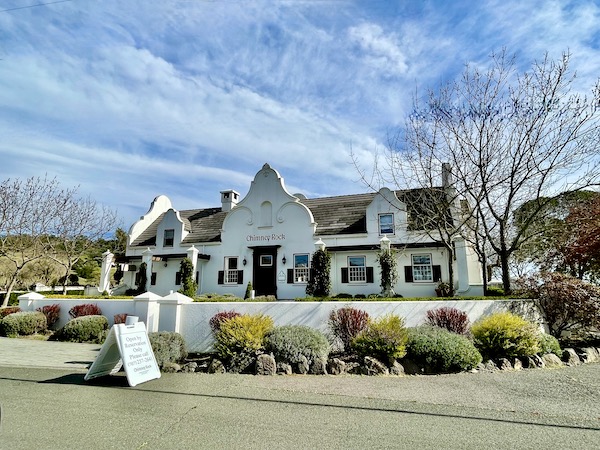 A white building with landscaping on our Napa Valley Winery Tour