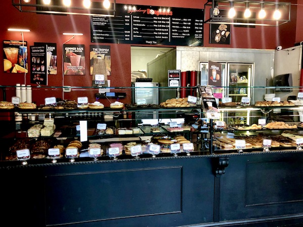 a glass pastry case in the Legendary Doughnuts Tacoma WA donut shop