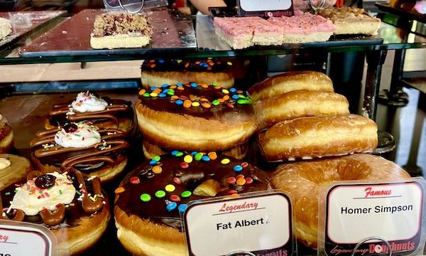 A close-up of donuts in a case at Legendary Doughnuts Tacoma WA