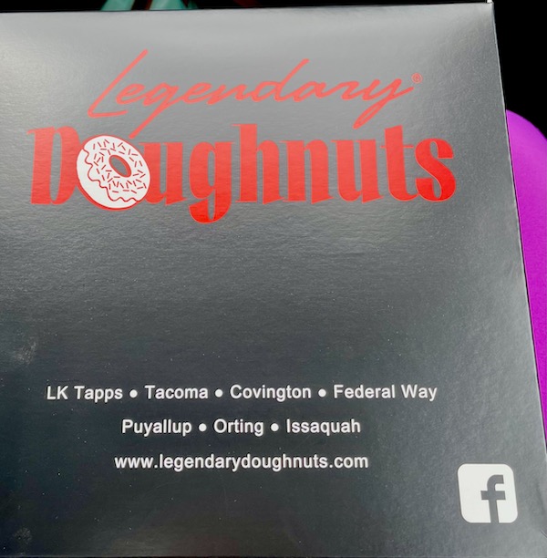 Black donut box lid with red lettering from Legendary Doughnuts Tacoma WA