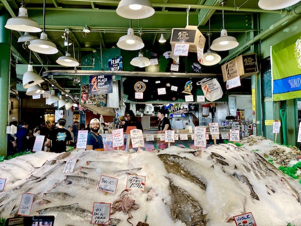 Assorted seafood on ice for sale at Pike Place Market Seattle WA