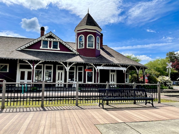 A dark red brick train station near Snoqualmie Falls Washington