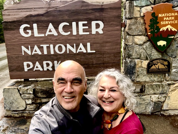 Steve and I in front of the sign for Glacier National Park Montana