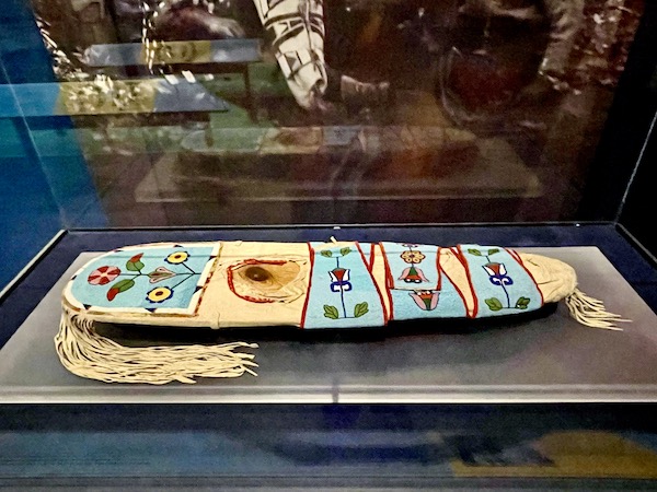 A beaded deer hide cradleboard on display at the Museum of the Rockies Bozeman MT