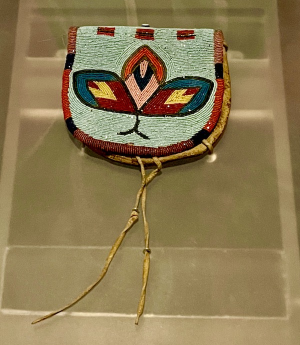Beaded belt bag of leather, glass and metal beads and thread on display at the Museum of the Rockies Bozeman MT