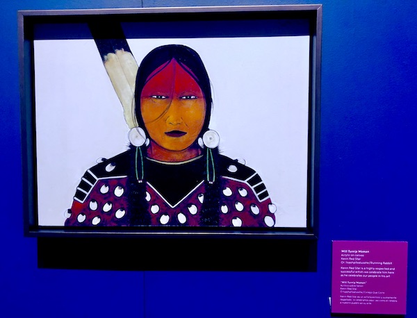 An acrylic on canvas painting of a native American woman at the Museum of the Rockies