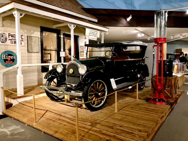 Antique car at a replica of an old filling station at the Museum of the Rockies