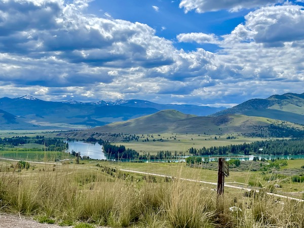 Mountains, rolling hills, river and trees on the National Bison Range Montana