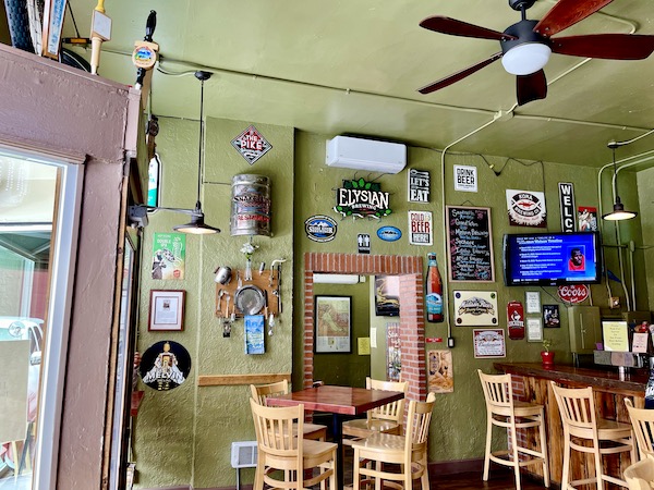 Interior of restaurant with light green walls during Our Day in Idaho Falls ID