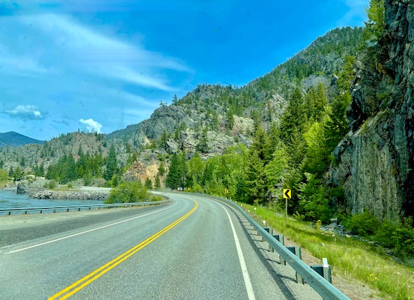 On the highway driving through a National forest en route from Spokane WA to Coram Montana