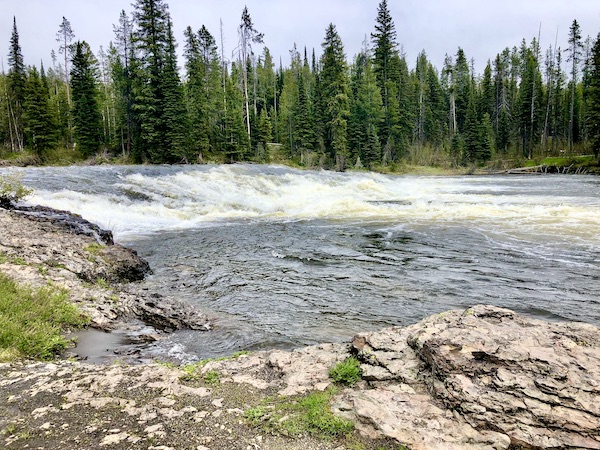 Short waterfall called Lower Mesa Falls seen while Visiting Ashton Idaho.