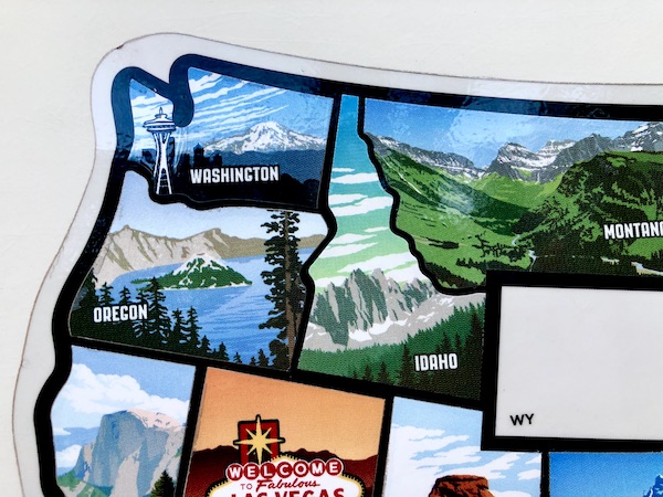 A decal map of the USA with many state stickers filled in while visiting Ashton Idaho