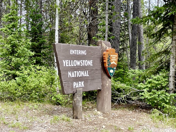 Sign for Entering Yellowstone National Park while Visiting Ashton Idaho.