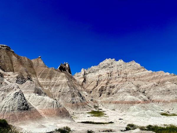 Mountains appear to have stripes of different colors at Badlands