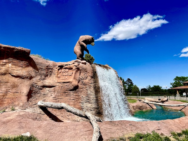 Entry to Bear Country USA in South Dakota. Cloud appears to be steam coming from bear statue.