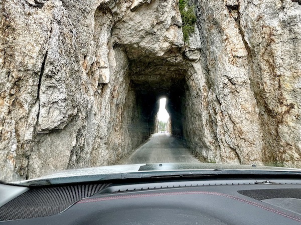 Very narrow tunnel with our Jeep about to pass through the needle's eye