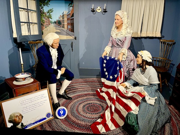 Wax figures of George and Martha Washington visiting flag maker Betsy Ross at the National Presidential Wax Museum Keystone SD