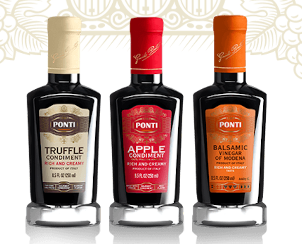Trio of glass bottles with colored labels holding balsamic vinegars, part of my 2022 Holiday Gift Guide