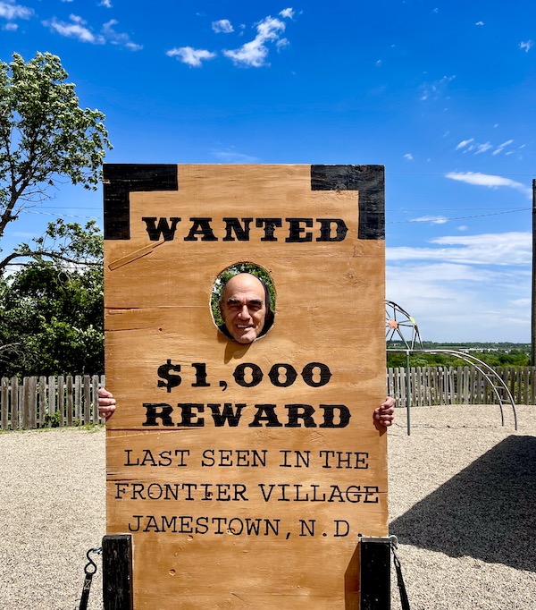 Steve with his head in a Wanted sign in Jamestown ND