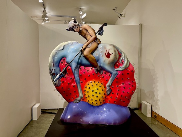 Large colorful sculpture of man on horse in museum in Fargo North Dakota