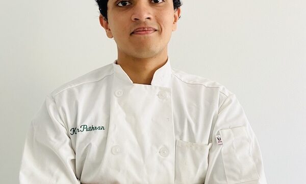 Man in chef coat with arms folded for my Interview With Chef Karan Puthran