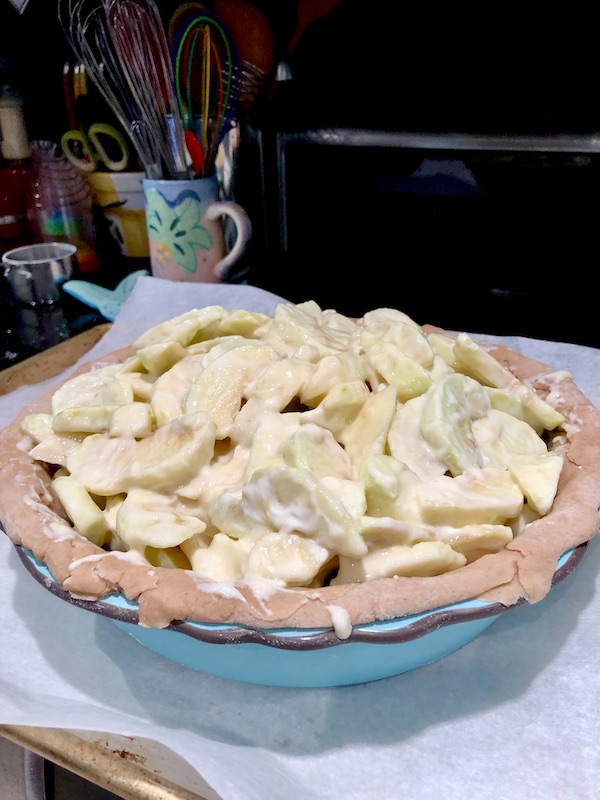 Pie shell filled with apple filling for Candied Apple Walnut Pie