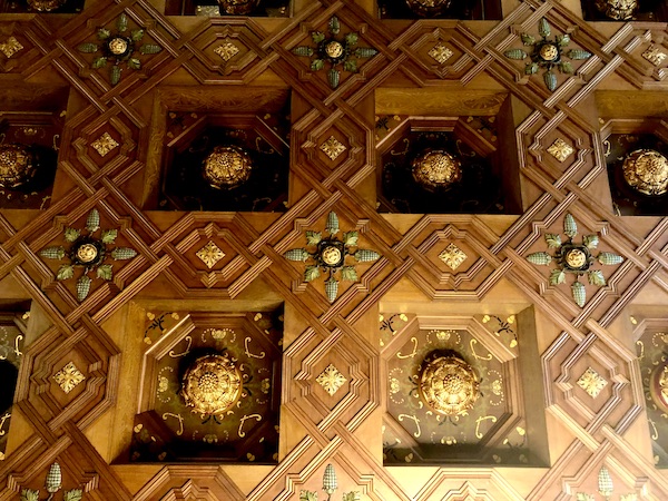 Carved wood, gold leaf and verdigris ceiling of the Supreme Court in the Nebraska State Capitol in Lincoln