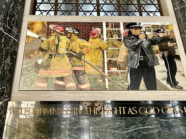 Firefighters in yellow gear and police are depicted in this mural in the Nebraska Capitol