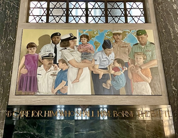 Mural of male and female military with children of all races in the Nebraska State Capitol in Lincoln