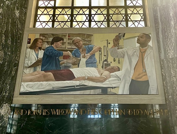 Mural of medical professional helping the sick is the Nebraska State Capitol in Lincoln