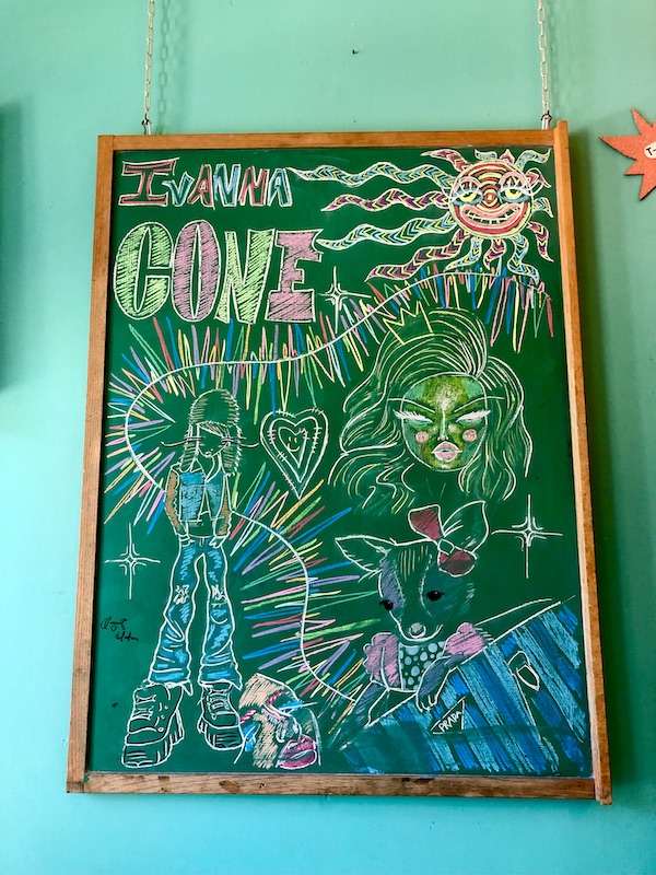 Framed chalkboard with whimsical drawing was Some Highlights of Lincoln NE