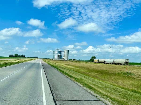Prairie, highway, blue sky and farm on our way to Trinity Heights Sioux City IA