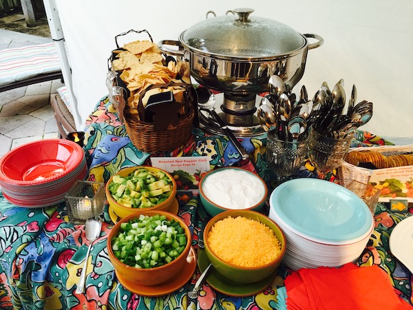 Chafing dish holding chilli and all of the accoutrements, one of 8 Ways to Celebrate With Food