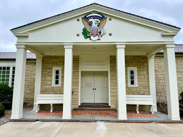 Pale yellow and white Federal style building housing the Herbert Hoover Library - Museum