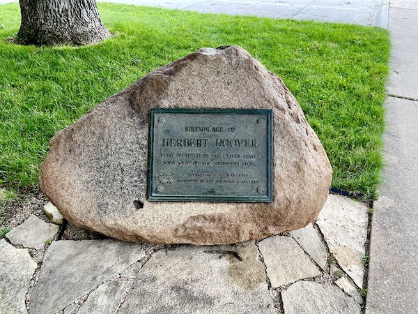 Rock with plaque noting H. Hoover was born at this site that's now the Herbert Hoover National Historic Site Iowa