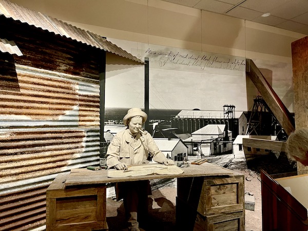 White plaster sculpture of H. Hoover working in Australia