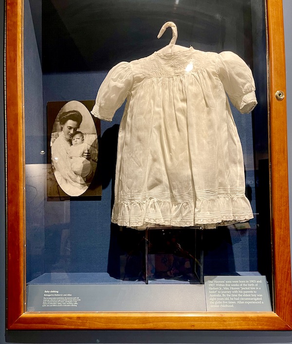 White linen christening gown on display at the Herbert Hoover National Historic Site Iowa
