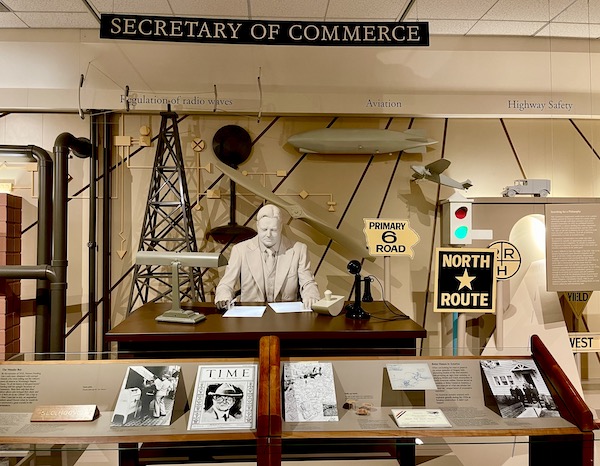 White plaster sculpture of Hoover as Secretary of Commerce in the Herbert Hoover National Historic Site Iowa