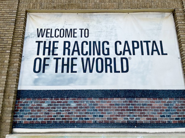 Black and white mural welcoming you to racing capital of the world