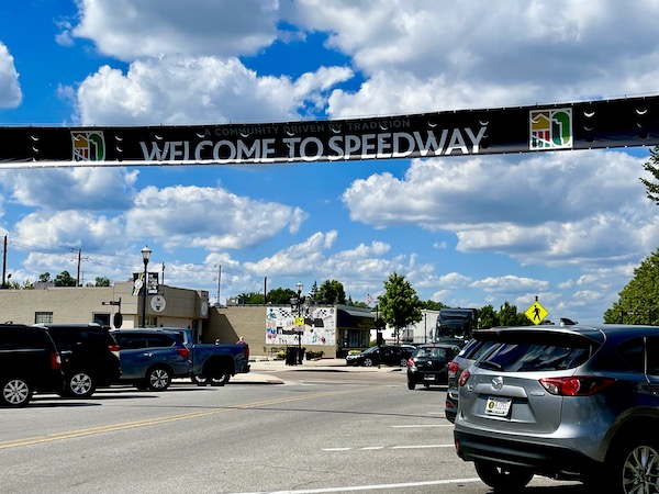 Black banner across a street welcomes you to the Indianapolis Speedway