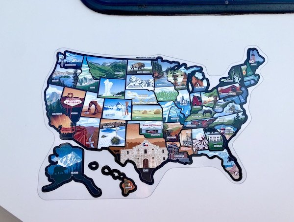 A map of the USA on the side of our RV showing we've been to every state!
