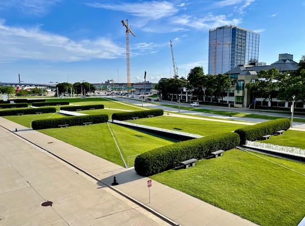 City park with rows of shrubs and fountains in front of the Milwaukee Art Museum Wisconsin