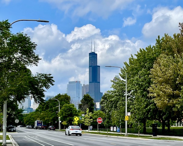 Tall black tower building dwarfs other skyscrapers on Our Driving Tour of Chicago IL