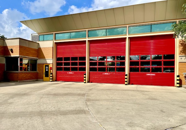 Chicago Firehouse with closed red garage doors seen on Our Driving Tour of Chicago IL